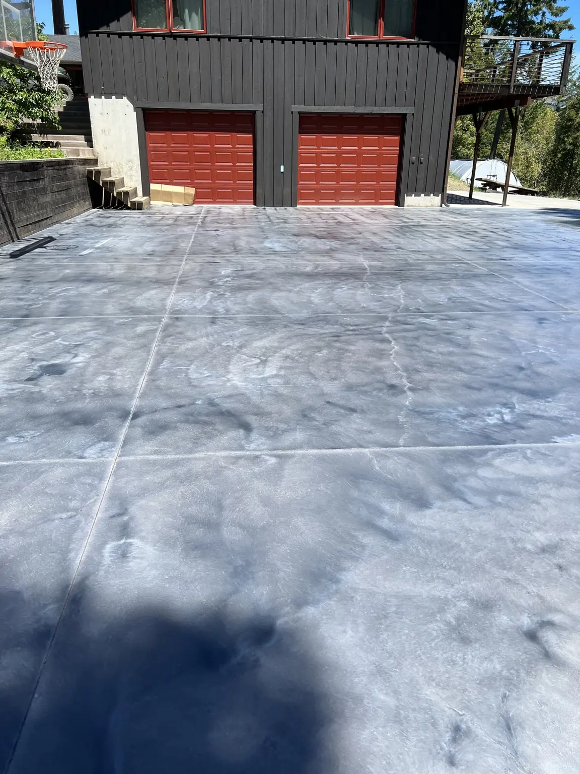 Old Mill Ranch basketball court concrete poured, stained and sealed by Peter