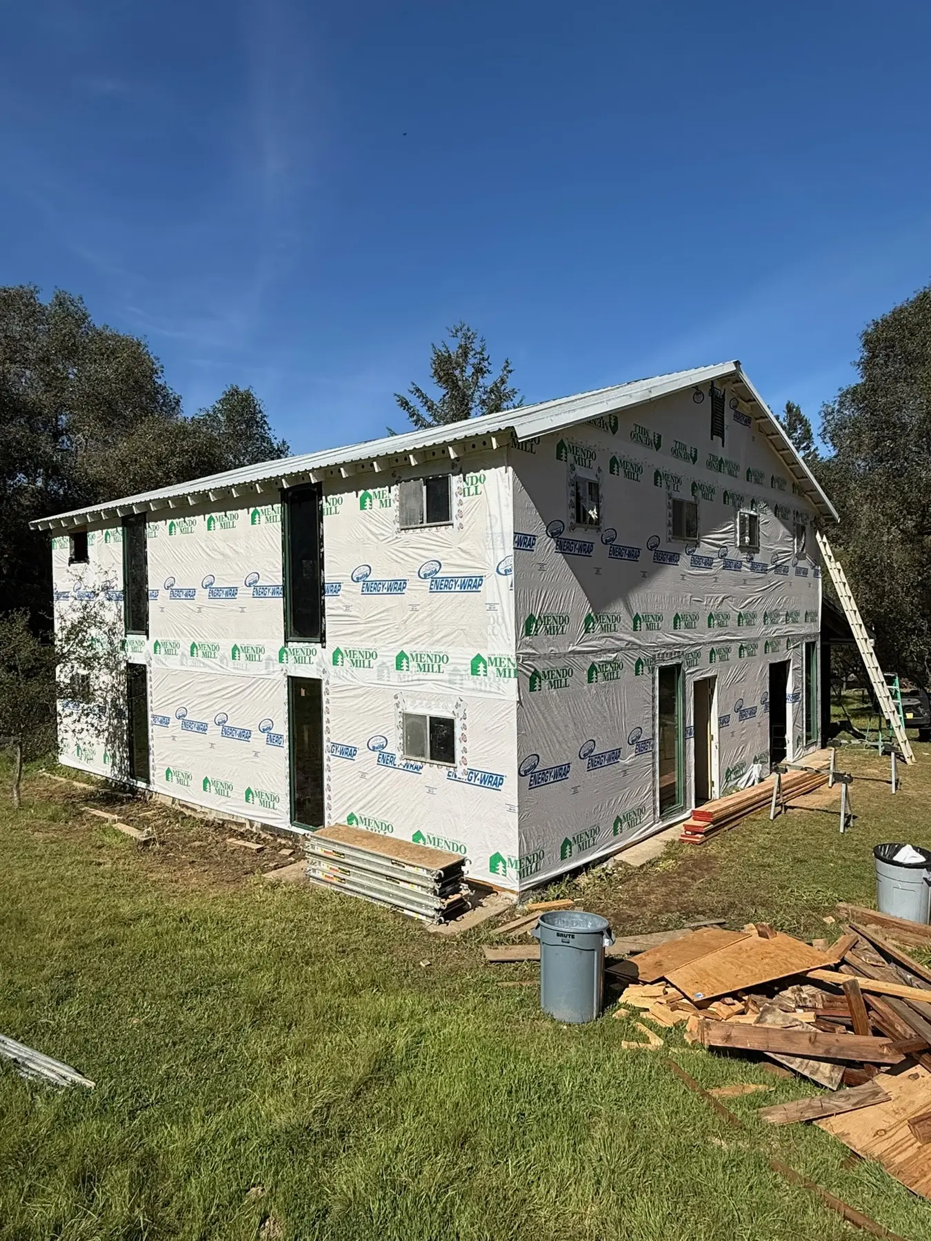 Rebuilt exterior sheathed and wrapped before metal siding