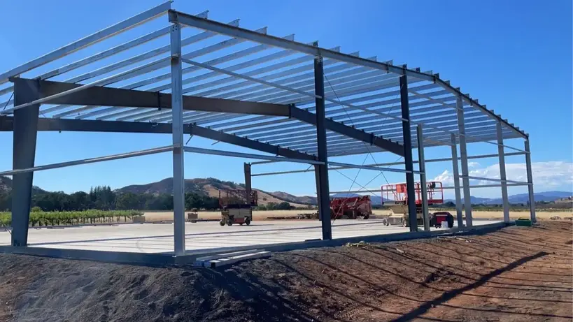 Steel frame of the 100 by 100 foot Lakeport ranch building