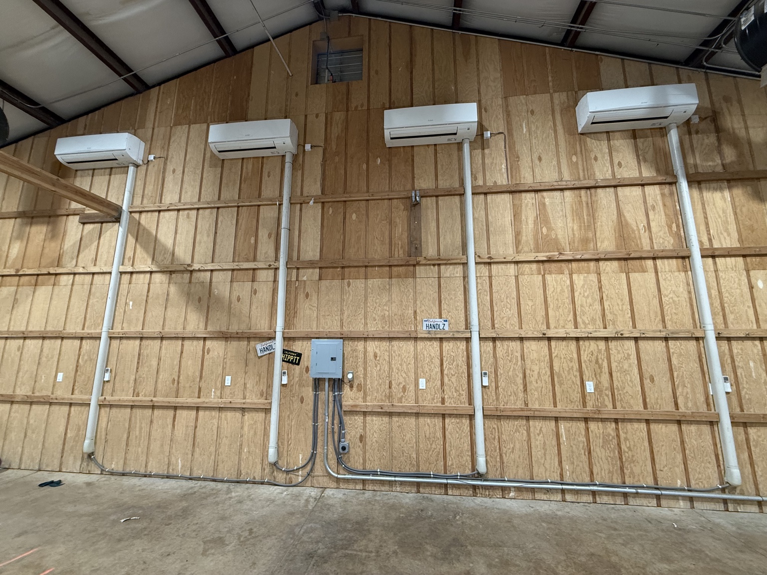 Finished shop interior with electrical distribution and four climate-control units